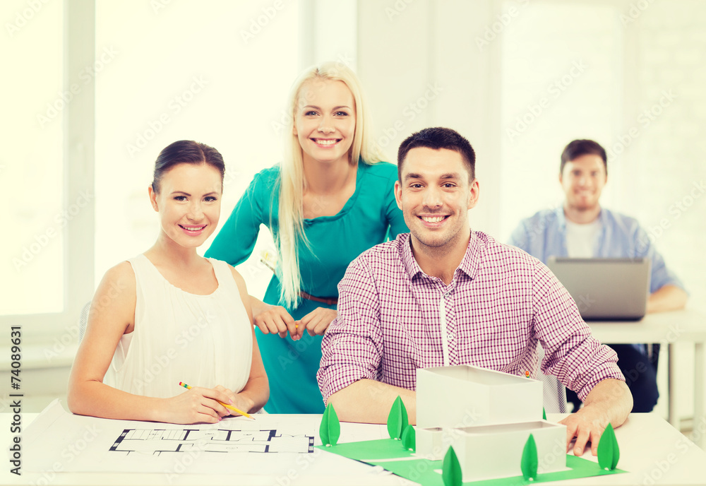 Poster smiling architects working in office