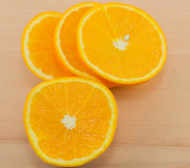 orange on a wooden board