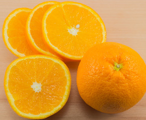 orange on a wooden board