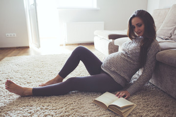 Home portrait of pregnant woman