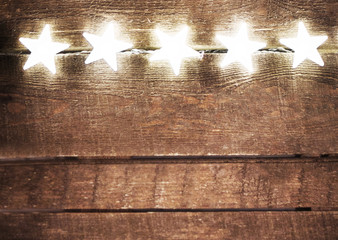 Christmas rustic background with lights and free text space. Fes