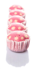 Pink colored steamed rice polka dot muffin or apam polka dot