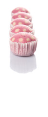 Pink colored steamed rice polka dot muffin or apam polka dot