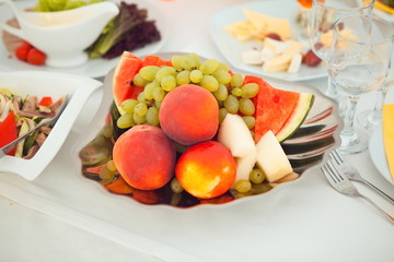 Fruit plate. Grape, peach, watermelon, cantaloupe