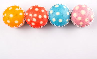 Colorful steamed rice polka dot muffin or apam polka dot