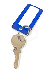 House key with blue tag isolated on white