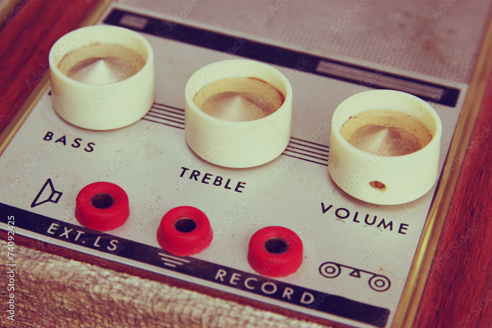 Wall mural macro closeup vintage amplifier dials.