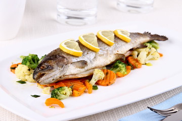 Grilled whole trout with vegetables