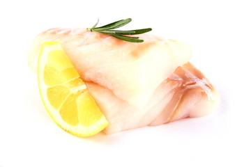 Cod fish fillet with lemon, rosemary on white