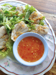 clsoed up boiled fish dip with spicy sauce