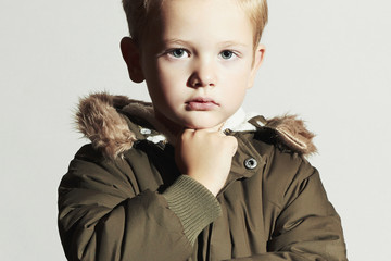 Fashionable child in winter coat.fashion kids.little boy © eugenepartyzan