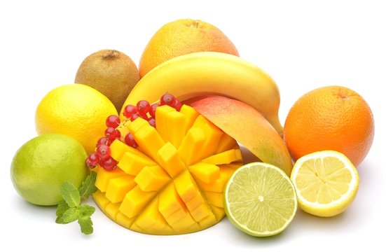 Slice of mango and other fruits on white background