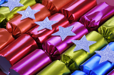Row of shiny festive Christmas cracker bon bons 