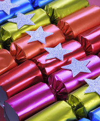 Row of shiny festive Christmas cracker bon bons 
