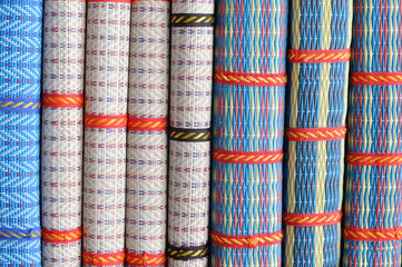 Colorful Thai mat stacking, for web background.