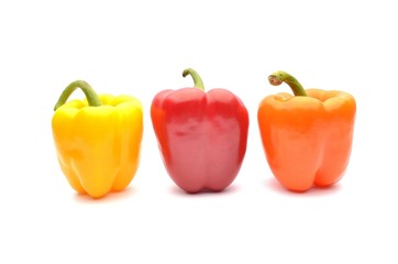 Colored Peppers Isolated On White Background