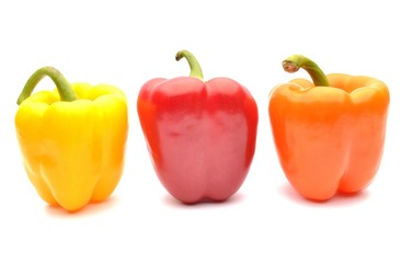 Colored Peppers Isolated On White Background