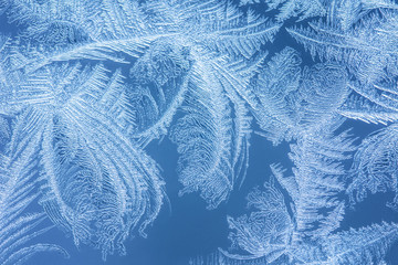 Winter background, frost on window