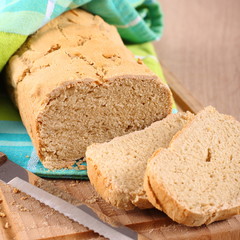 Fresh from the oven gluten free bread on a cutting board