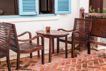 old wooden chair with wooden table at home