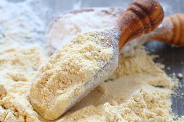 gluten free chickpeas flour in wooden scoop