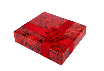 red roses gift box with ribbon on a white background