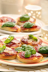 Roast sandwich with bacon and cheese on a plate