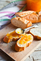 pieces of baguette with orange marmalade