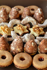 Decorated Christmas cookies on the brown plate