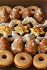 Decorated Christmas cookies on the brown plate
