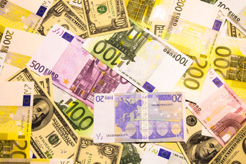 banknotes of euros and dollars