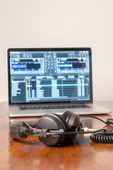 Obraz na płótnie Canvas Headphones on a laptop computer