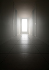empty room with open door and white wall