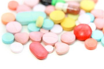 Many colorful pills close up shot