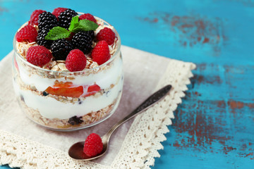 Healthy breakfast - yogurt with  fresh fruit, berries and