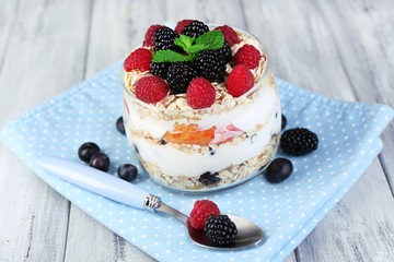 Healthy breakfast - yogurt with  fresh fruit, berries and