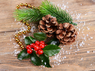 Composition of Christmas decorations on wooden background