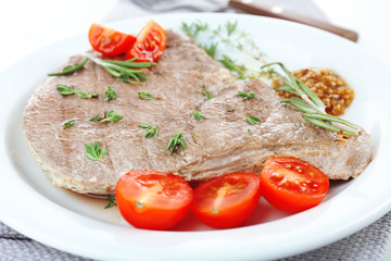 Delicious grilled meat on table