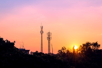 sunset sky with silhouette antenna