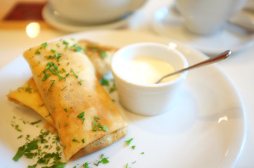 Tasty pancakes on plate in cafe