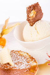 tasty sweet pancakes with vanilla icecream and topping
