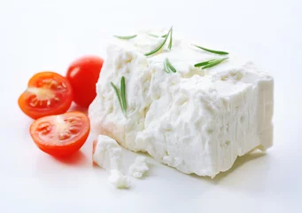 Gordijnen Feta cheese isolated on white © Africa Studio