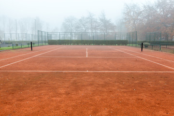 tennis court with fog