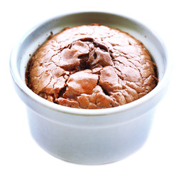 Hot chocolate pudding with fondant centre isolated on white