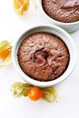 Hot chocolate pudding with fondant centre on white table