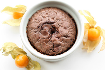 Hot chocolate pudding with fondant centre on white table