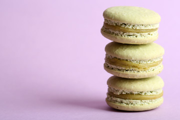 Gentle colorful macaroons on color background