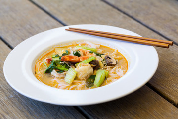 Bowl of traditional Thai tom yam soup