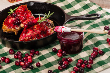Cast iron skillet and glazed chicken