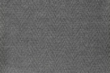 Abwaschbare Fototapete Staub Texturstoff ein Fischgrät von grauer Farbe